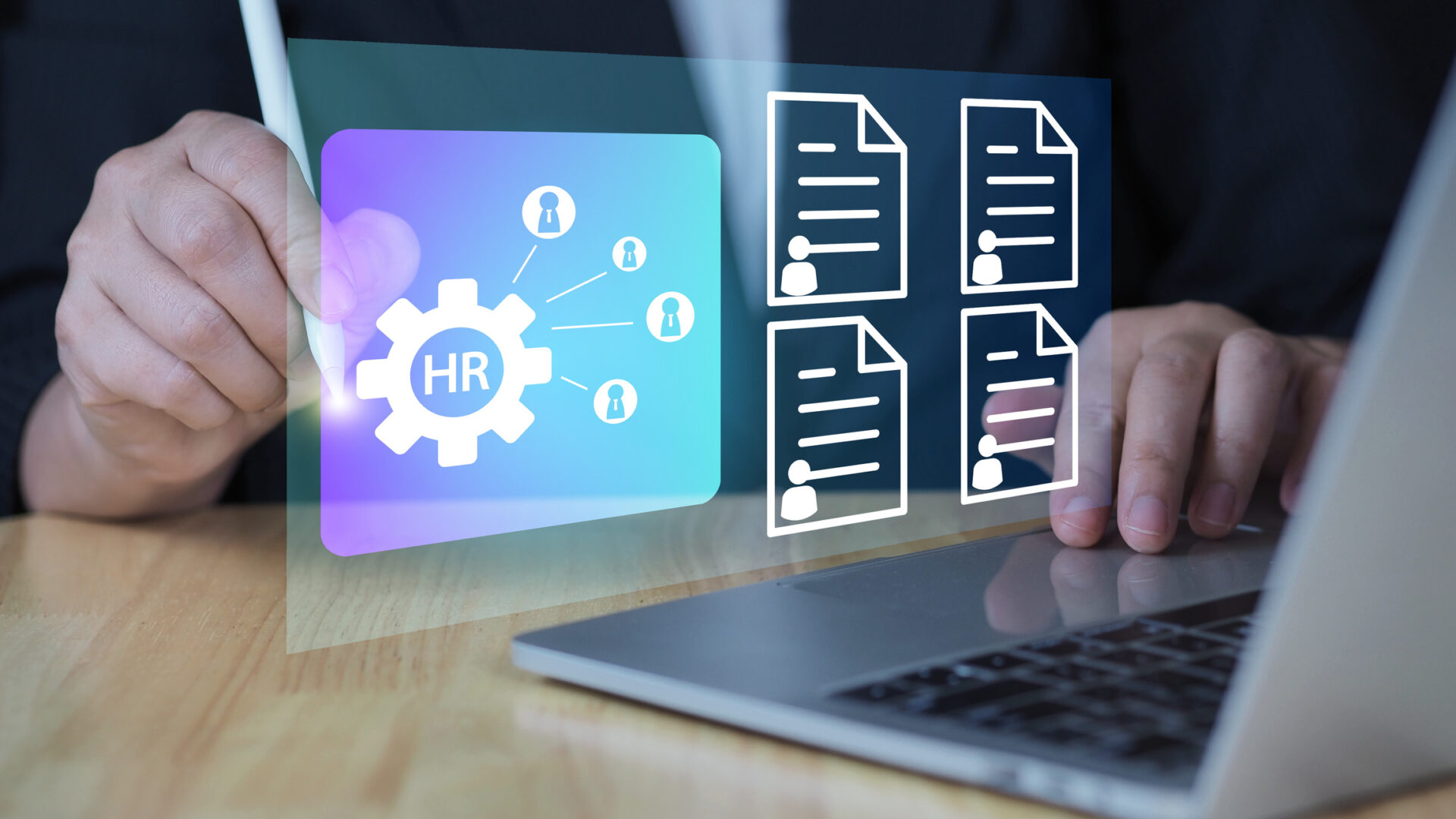 Person using laptop with HR dashboard