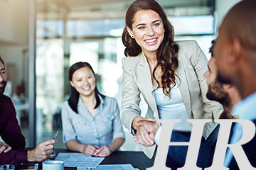 Business meeting handshake with colleagues
